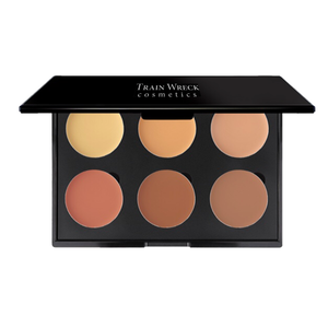 Train Wreck Cosmetics Revolutionary Corrector Palette 6 Well for medium dark skin tones.